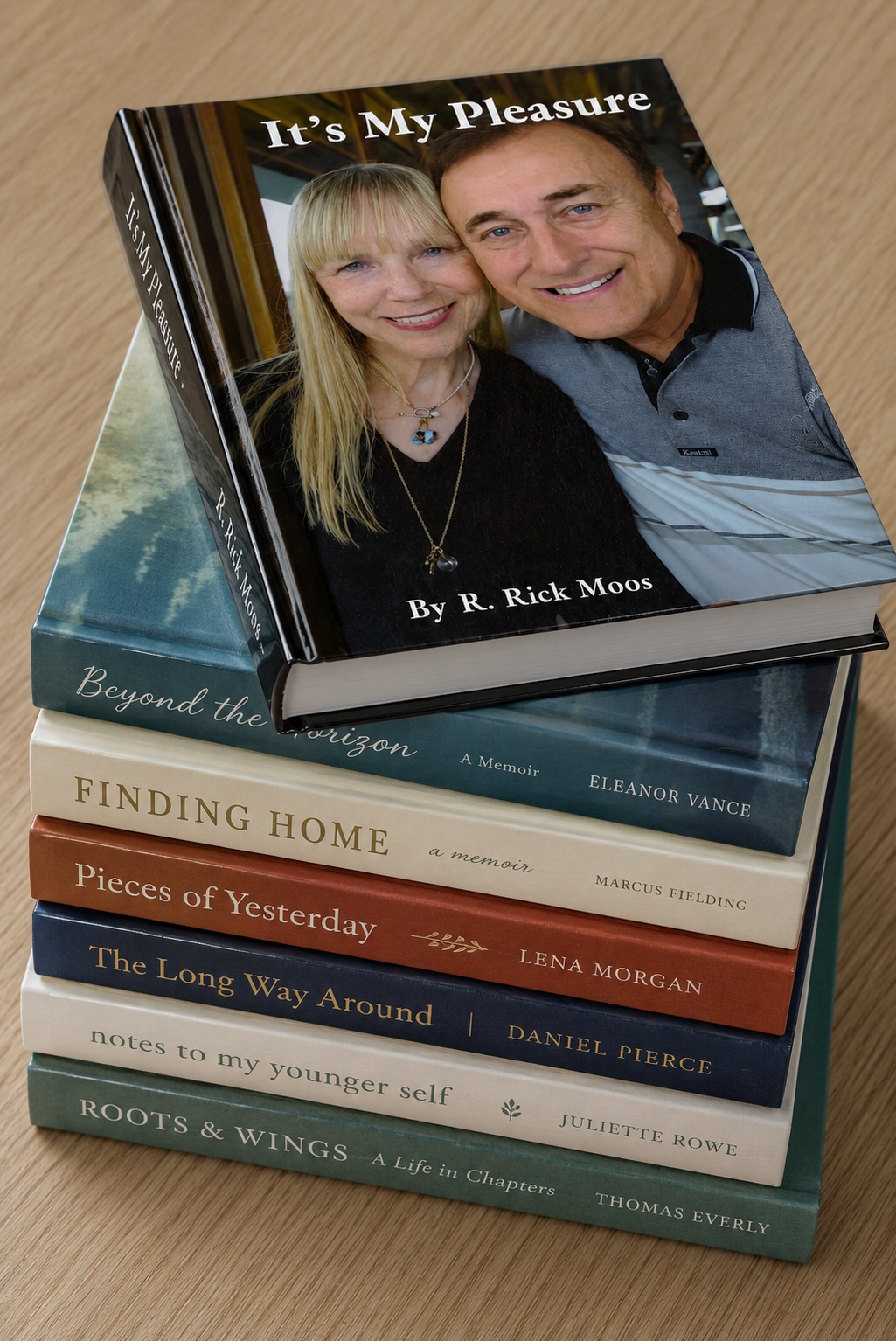 A stack of memoir books with a featured sample memoir on top.